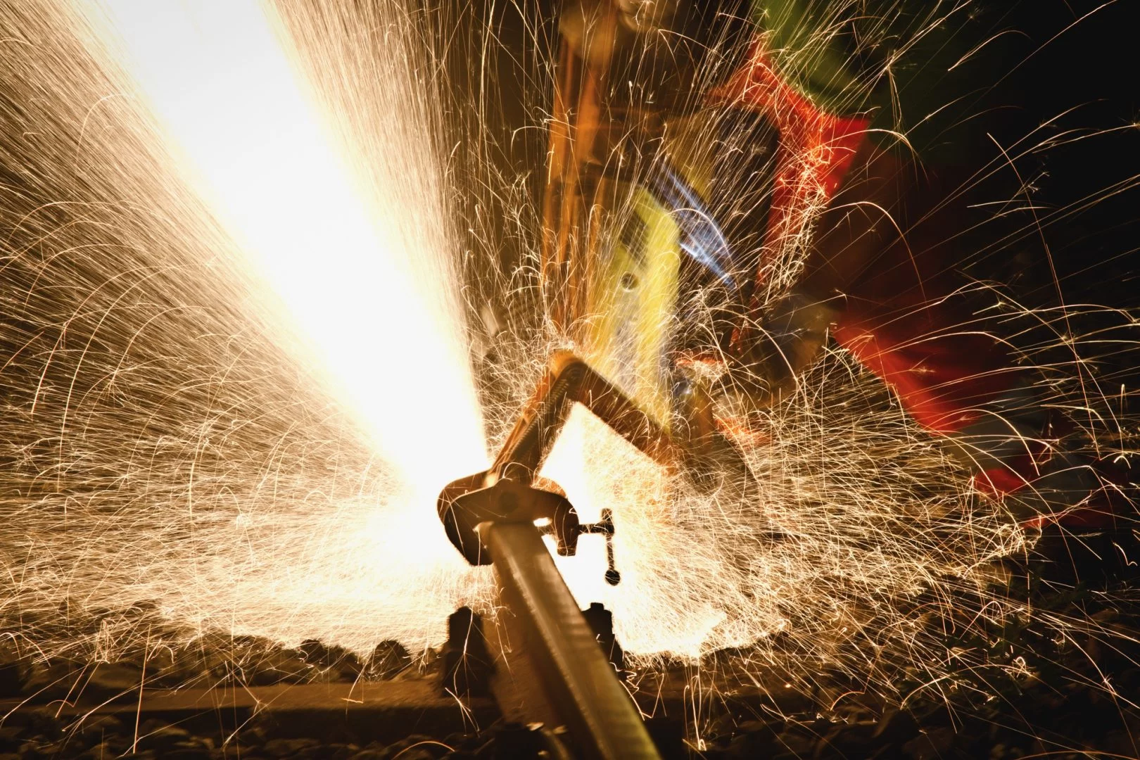 Anonymous man working with steel